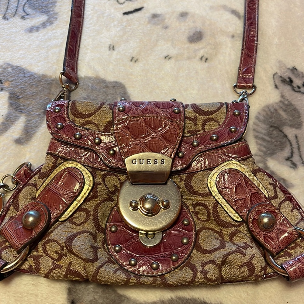 Guess women’s crossover bag purple and tan